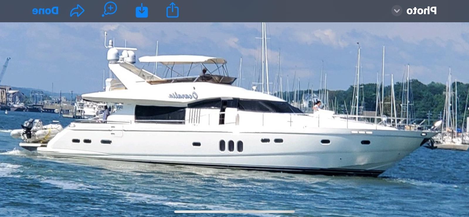 a white yacht in the water aboard OCARALIA Yacht for Sale