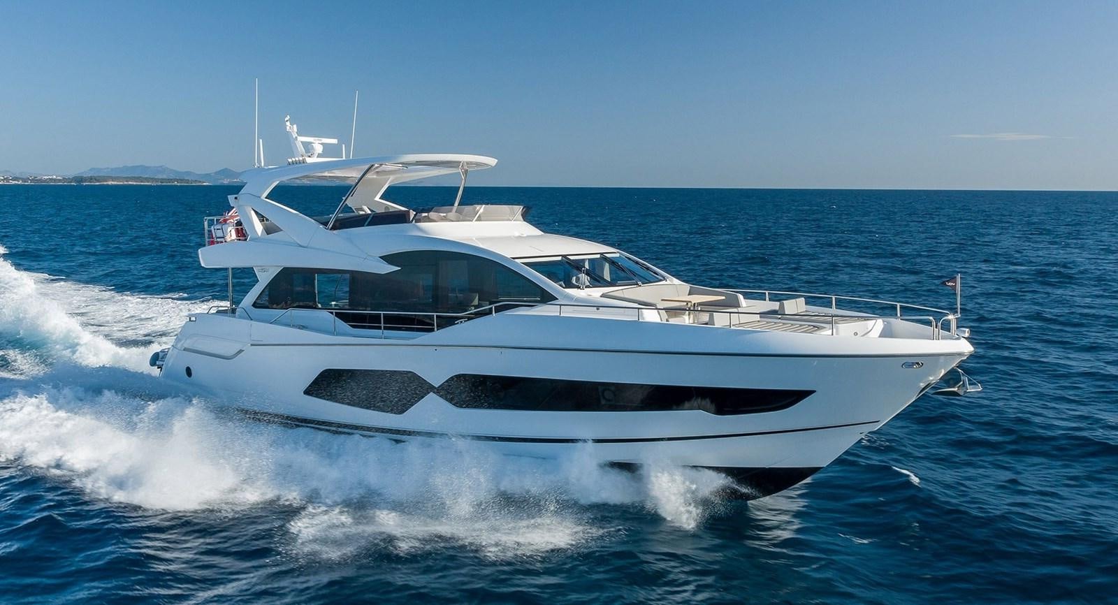 a white yacht on the water aboard JOURNEY Yacht for Sale