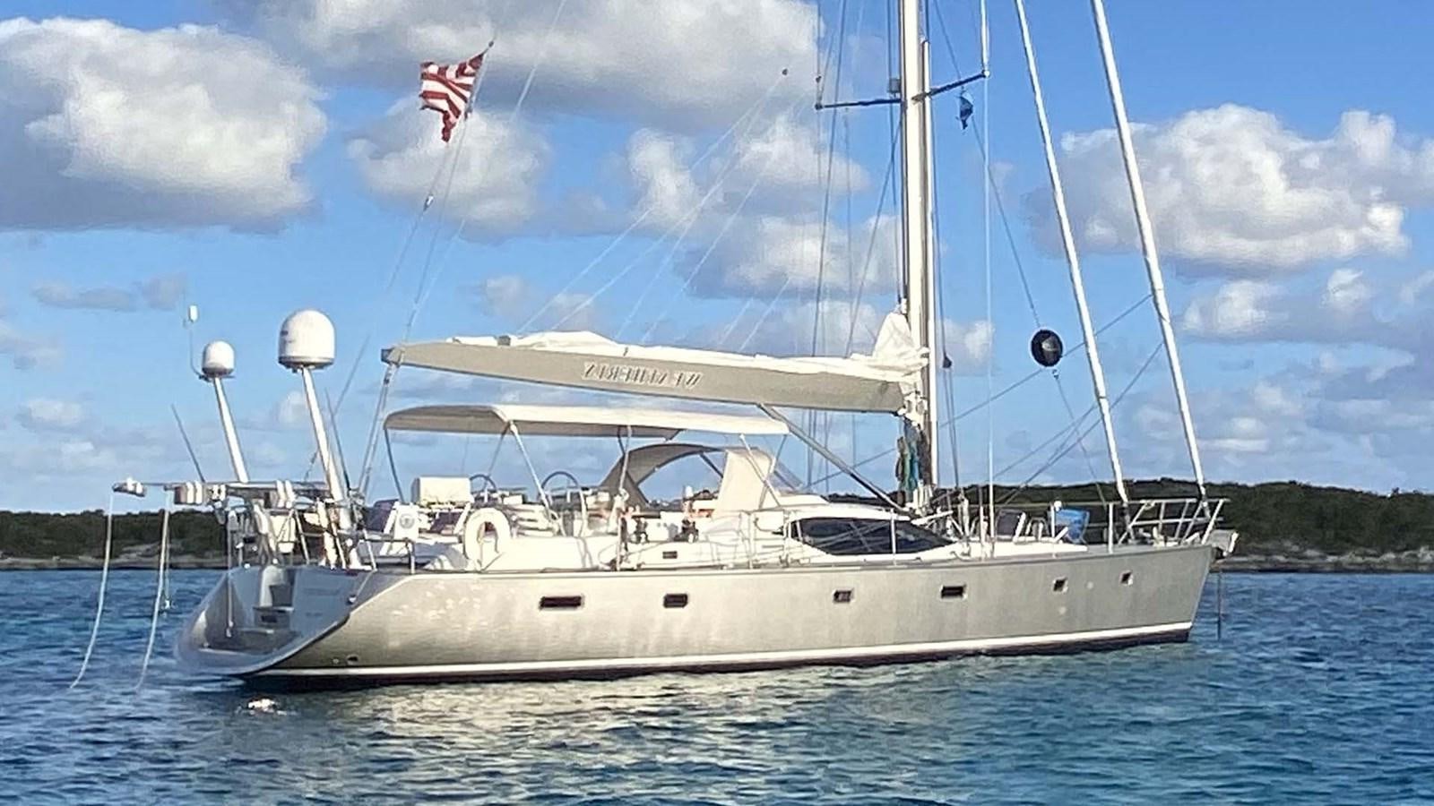 a large white boat in the water aboard WEATHERLY Yacht for Sale