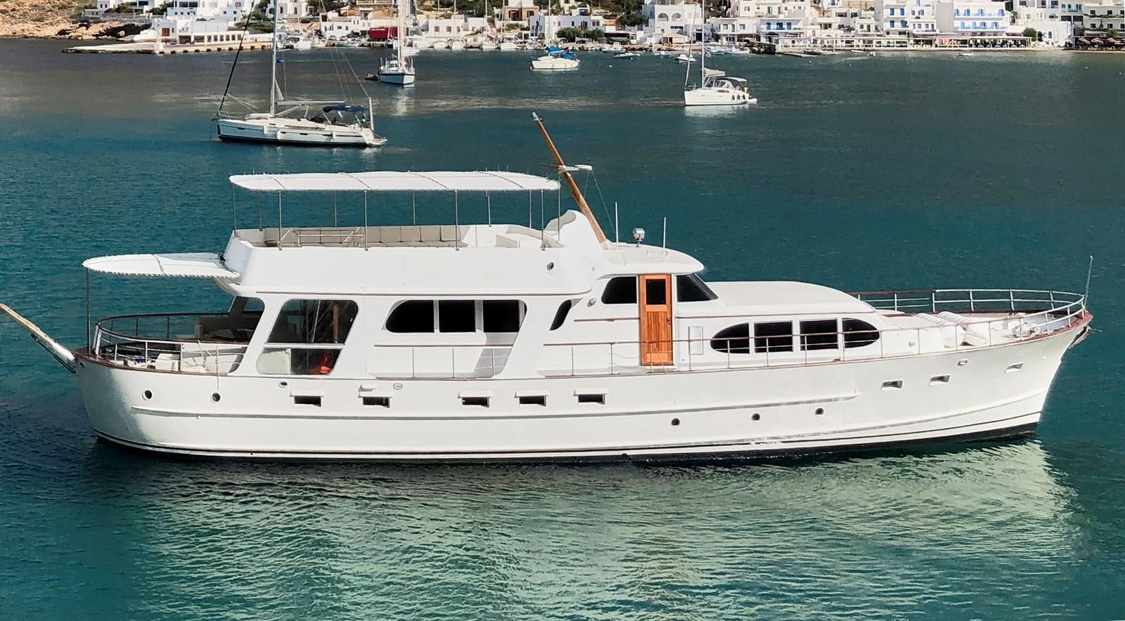 a white yacht in the water aboard PRINCESS SOFIA Yacht for Sale