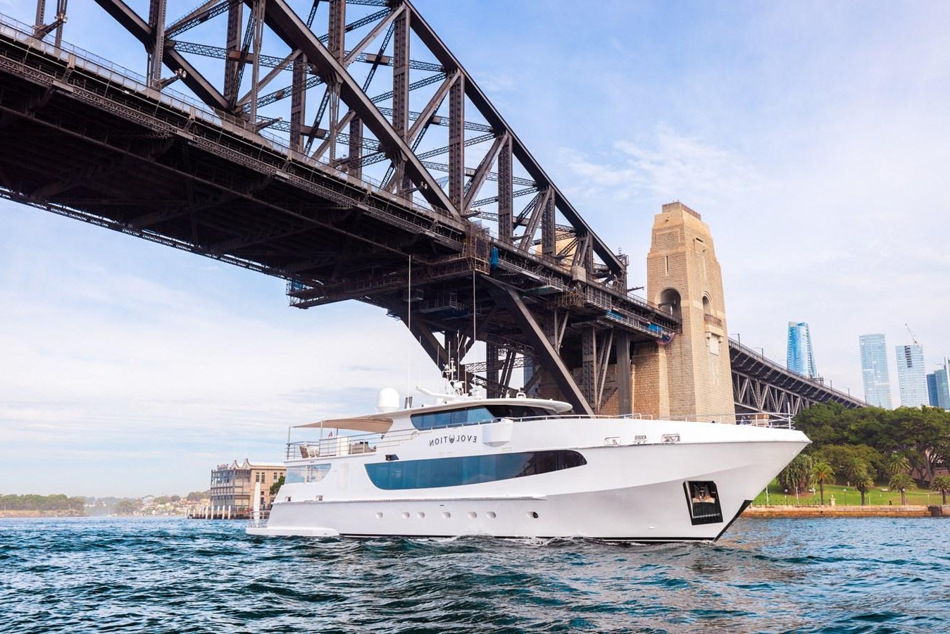 a boat under a bridge aboard EVOLUTION 1 Yacht for Sale
