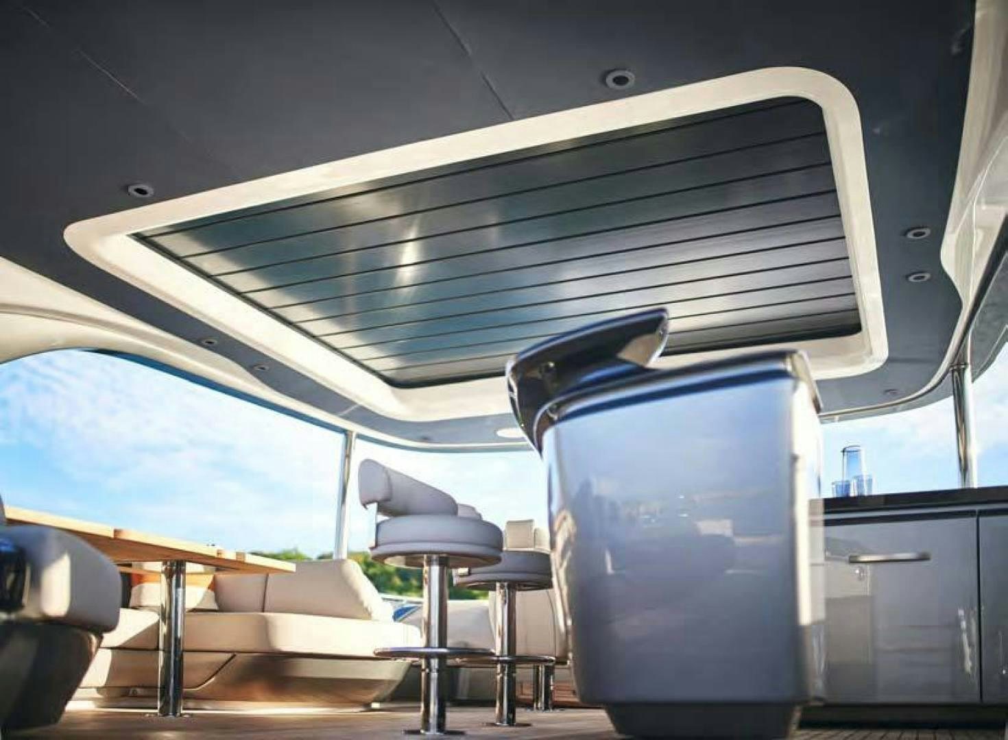 a blue suitcase on a train aboard Y85 Yacht for Sale