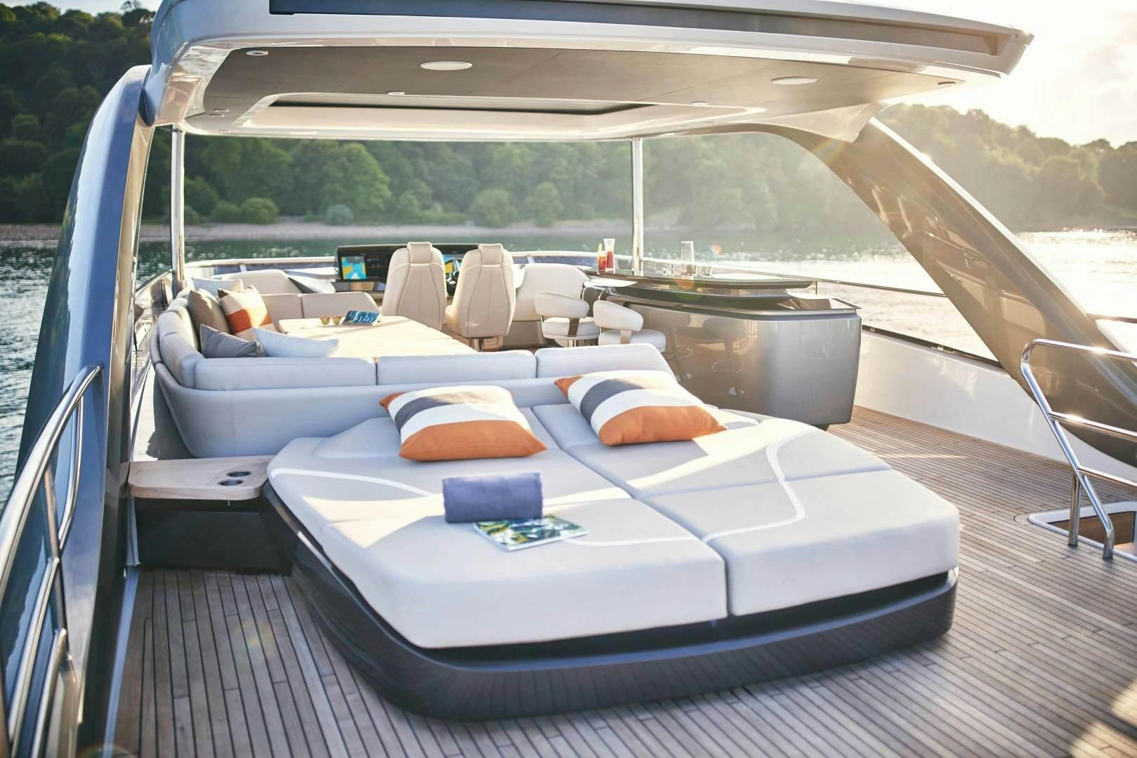 a large white boat with a large deck and a pool aboard Y85 Yacht for Sale