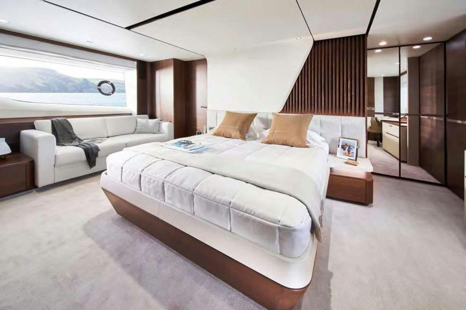 a bed in a room aboard Y85 Yacht for Sale