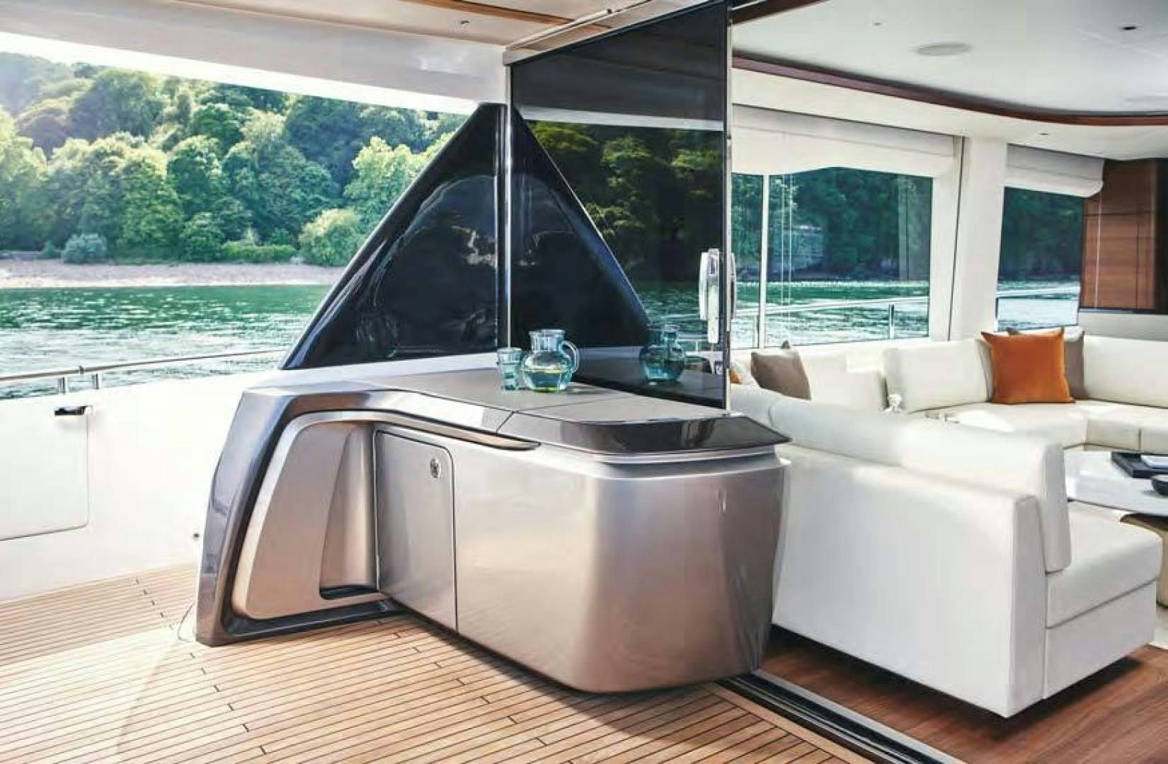 a modern looking kitchen with a large window aboard Y85 Yacht for Sale