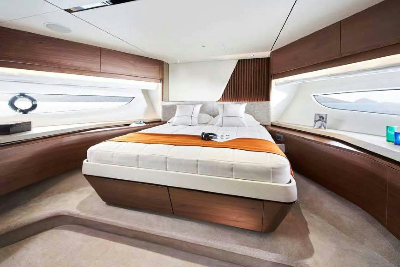 a bed in a room aboard Y85 Yacht for Sale