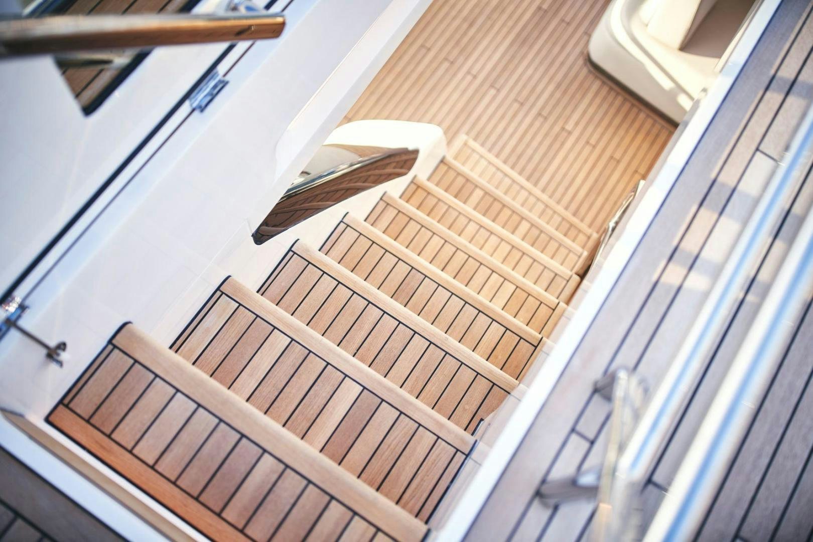 a bird on a railing aboard Y85 Yacht for Sale