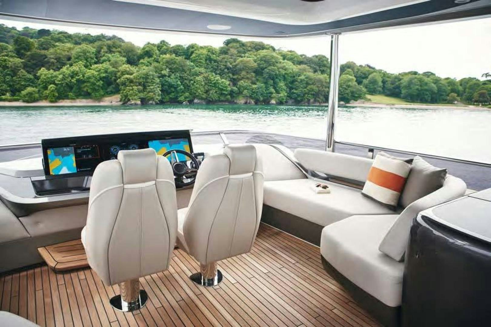 a room with a couch and a tv aboard Y85 Yacht for Sale