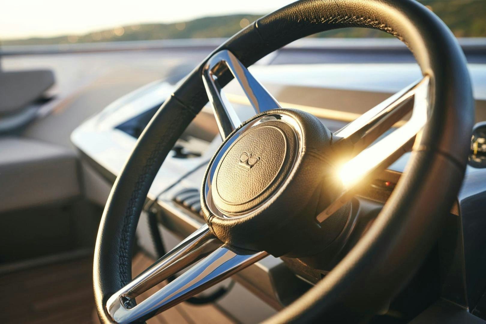 a steering wheel and steering wheel of a car aboard Y85 Yacht for Sale