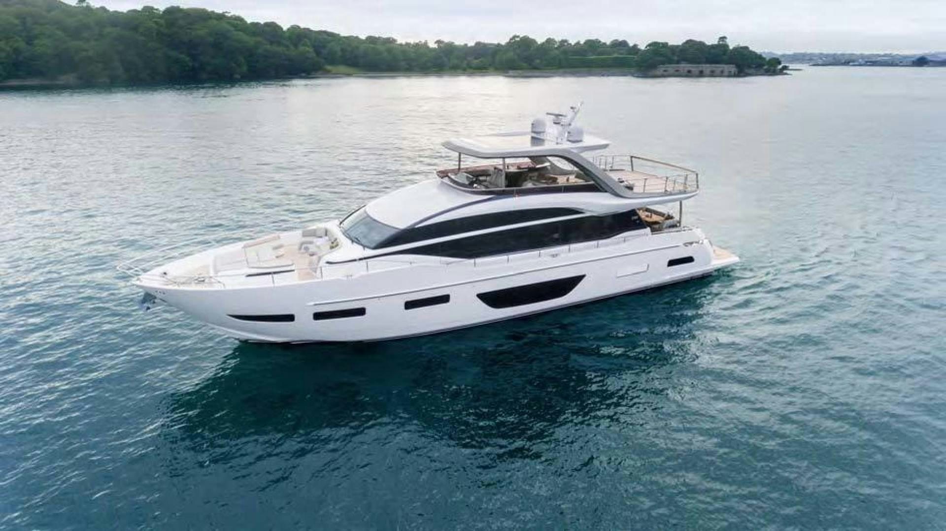 a white yacht in the water aboard Y85 Yacht for Sale
