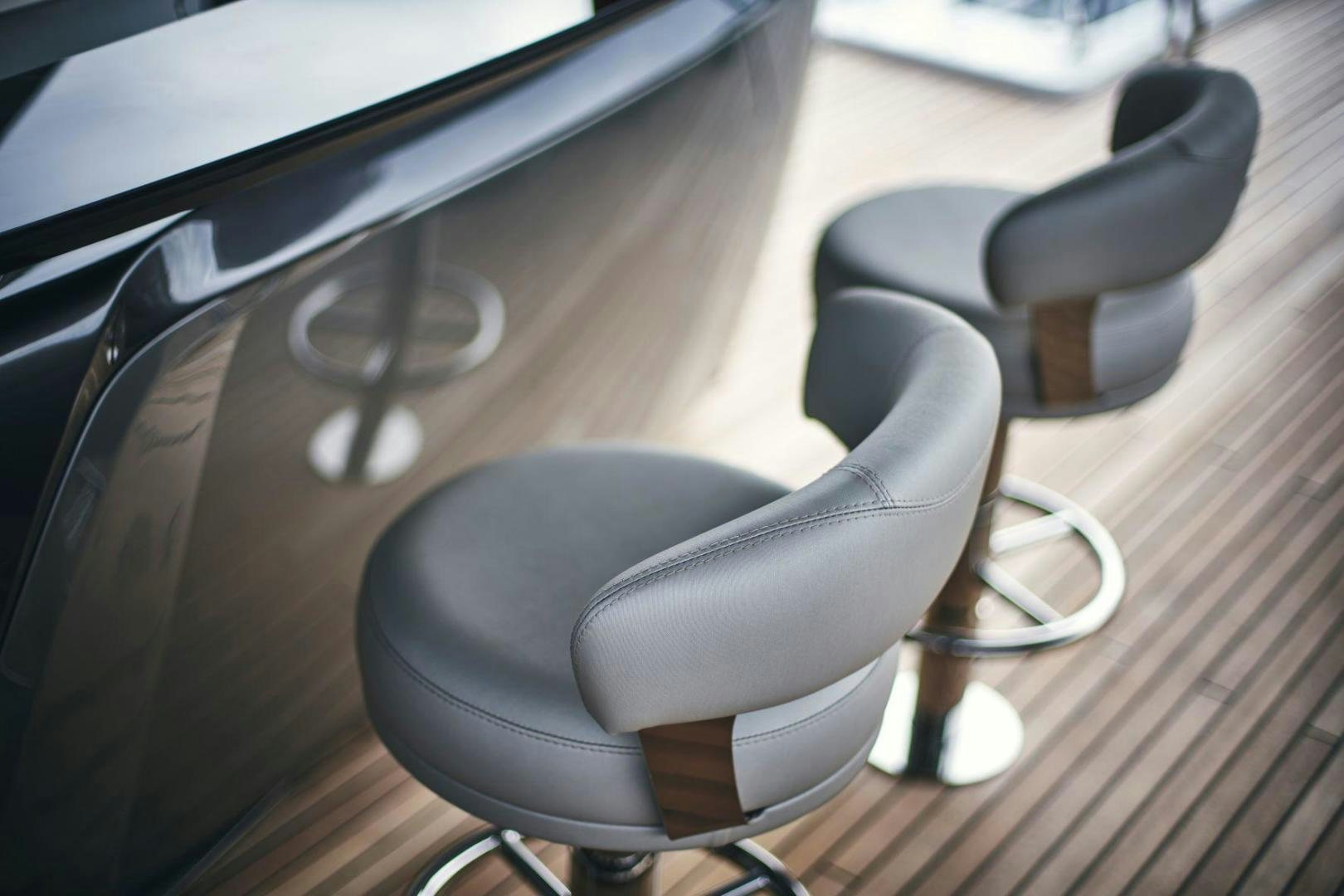 a close-up of a car seat aboard Y85 Yacht for Sale