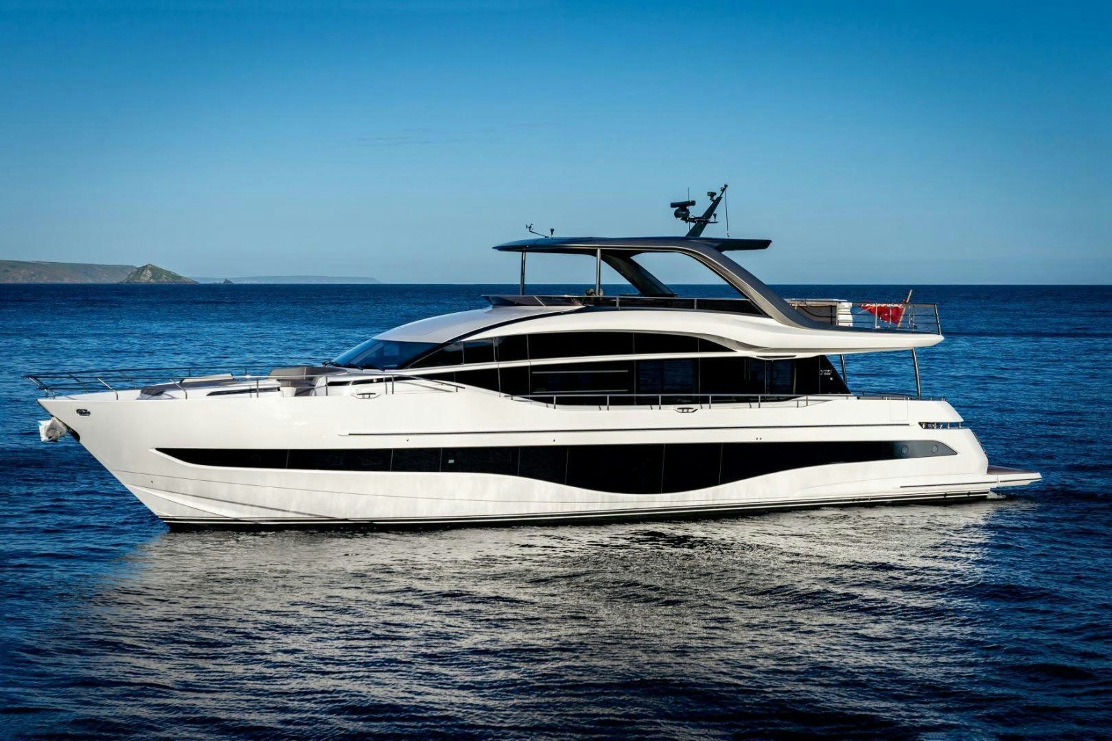 a white yacht in the water aboard Y85 Yacht for Sale