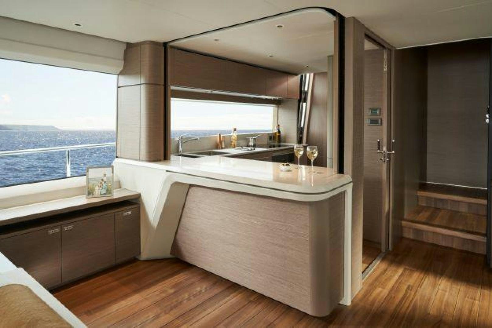 a large bathroom with a large mirror aboard Y85 Yacht for Sale