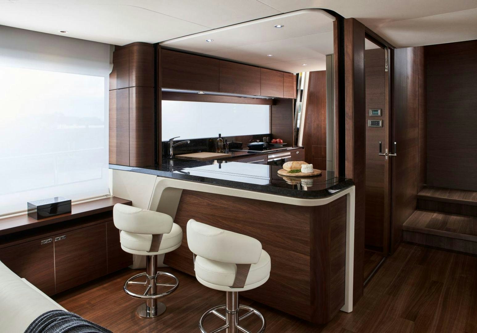 a kitchen with a mirror aboard Y85 Yacht for Sale
