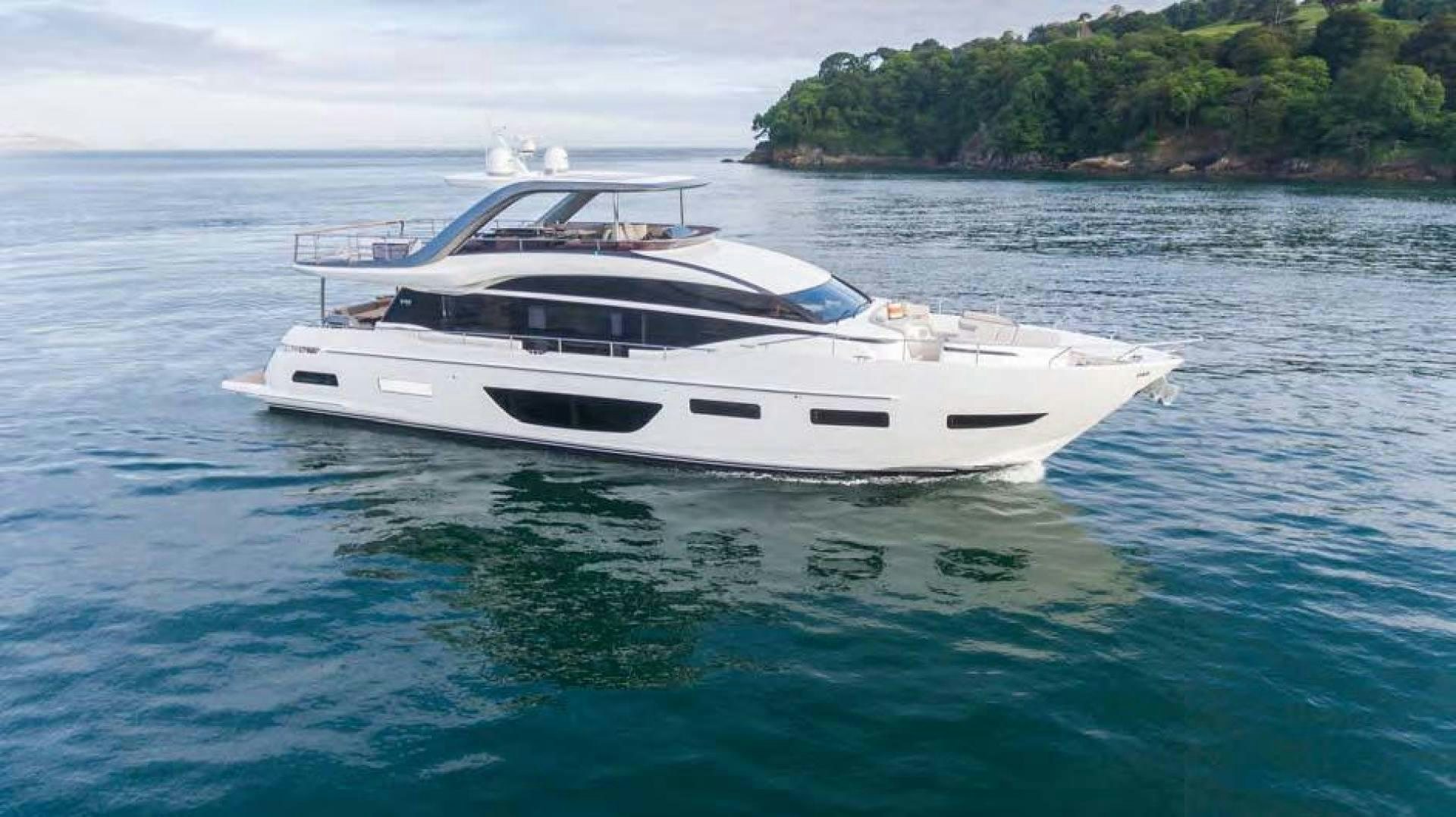 a white yacht in the water aboard Y85 Yacht for Sale