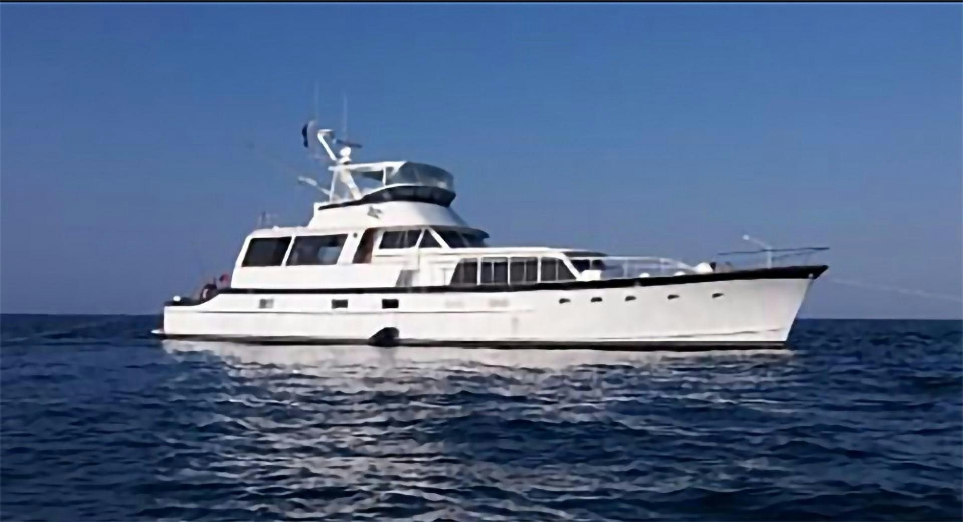 a white yacht in the water aboard FANTASEA Yacht for Sale