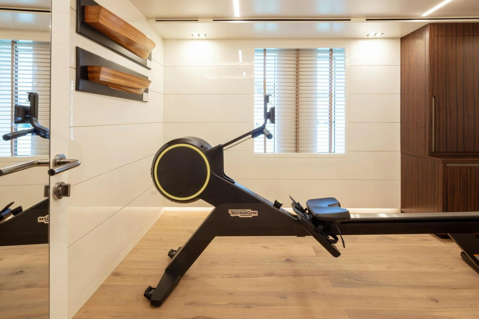 a gym with a gym aboard ATOM Yacht for Sale