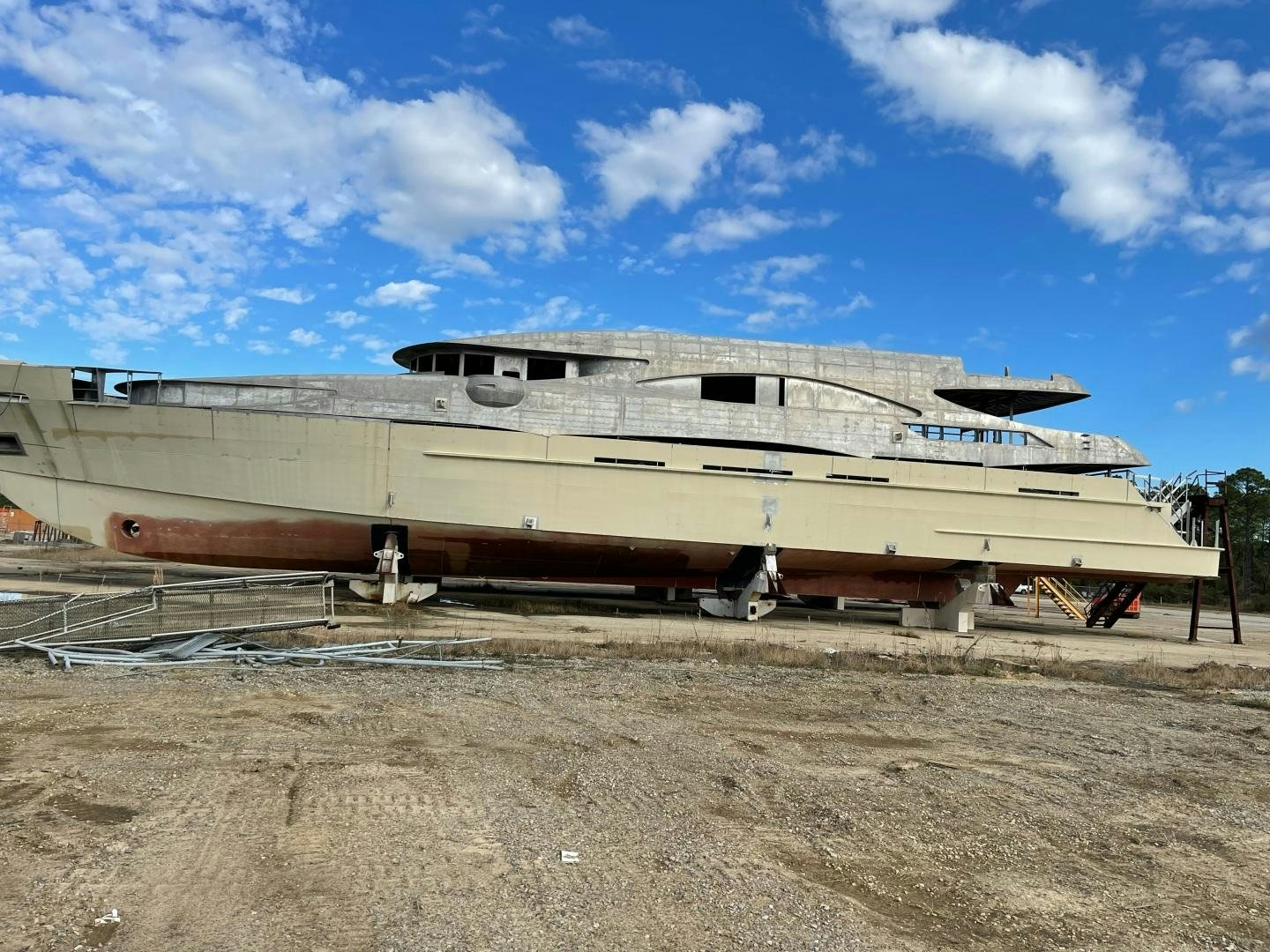 a boat on the beach aboard TRINITY T052 Yacht for Sale