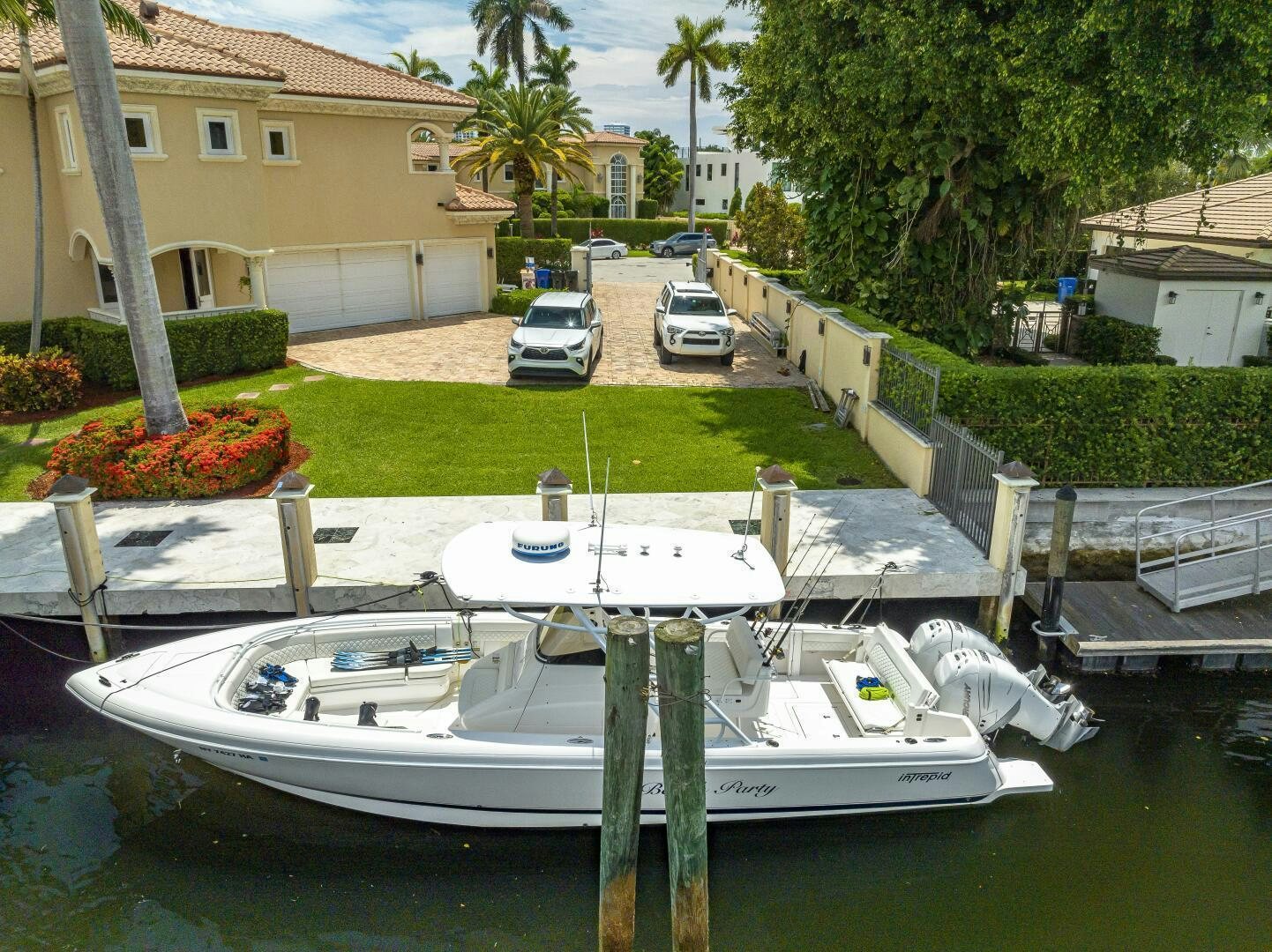 a boat parked on the side of a road aboard BEACHFRONT II Yacht for Sale