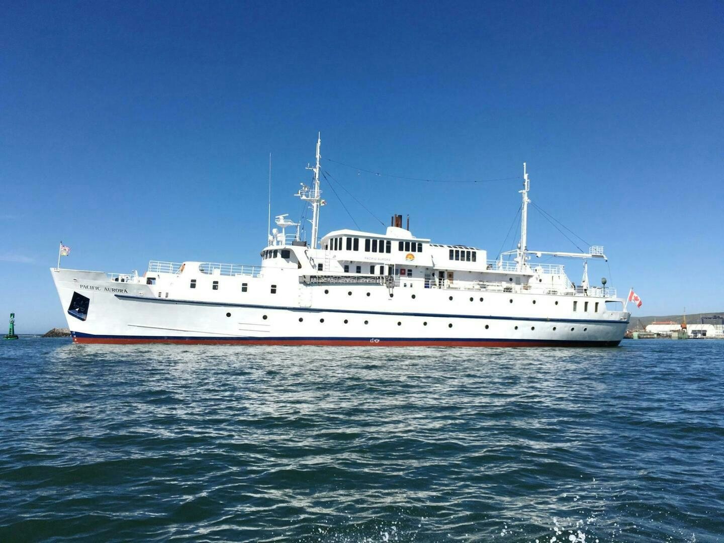 a large white boat in the water aboard SALTY Yacht for Sale