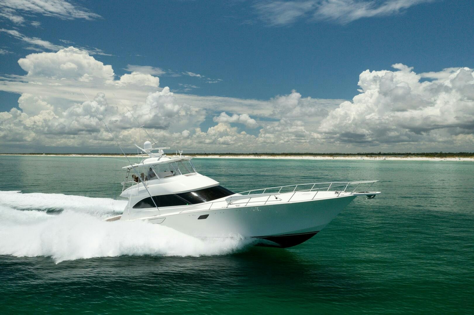 a white yacht in the water aboard SMOOTH RIDE Yacht for Sale