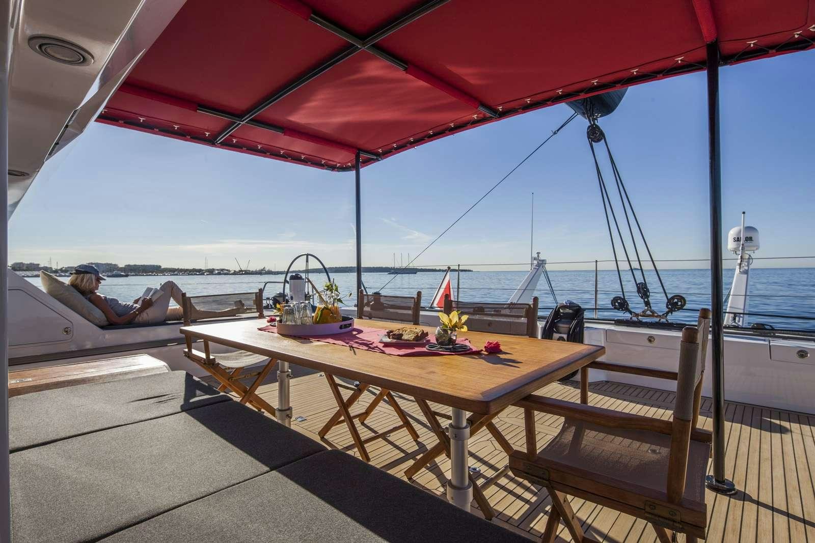 a table on a boat aboard TAJ Yacht for Charter