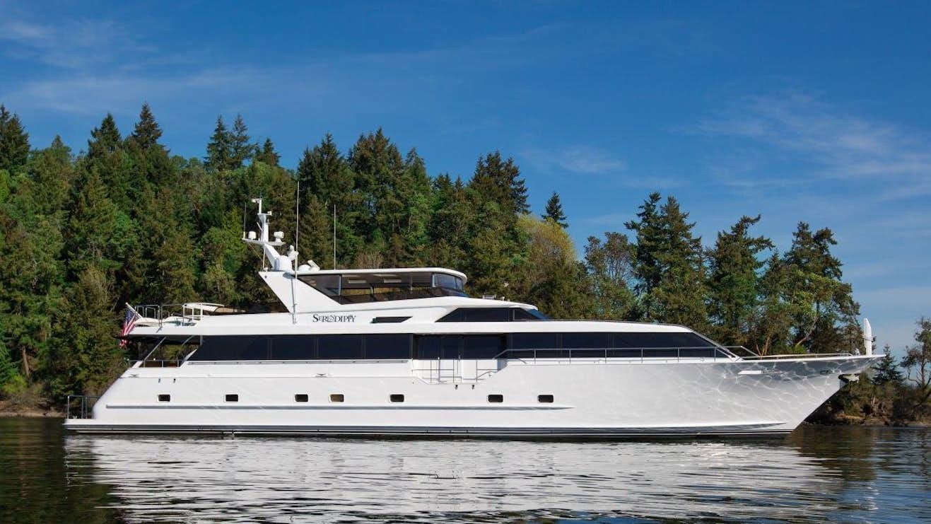 a white yacht on the water aboard BLACKWOOD Yacht for Charter