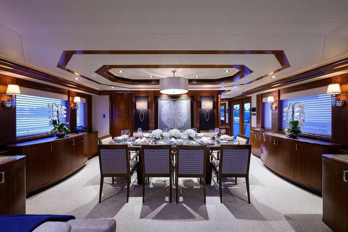 a large dining room with a table and chairs aboard LADY JJ Yacht for Charter