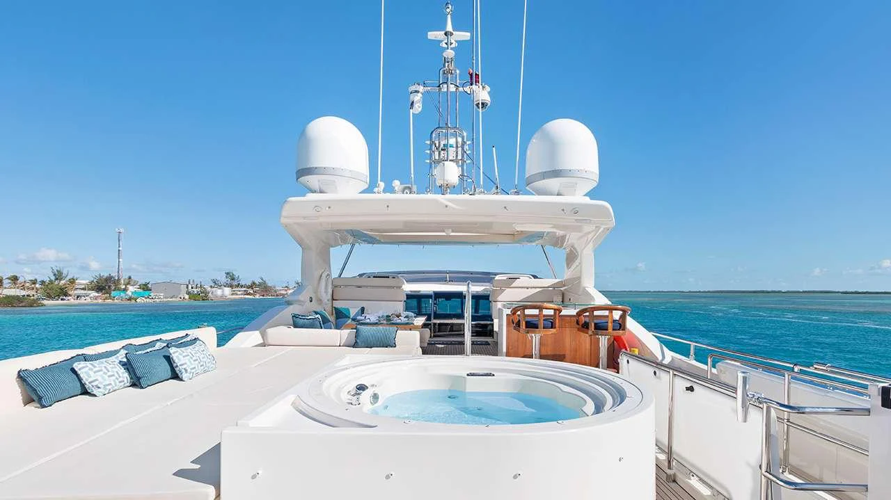 The sundeck features a luxurious jacuzzi with ample seating and stunning ocean views. aboard LA MAR Yacht for Charter