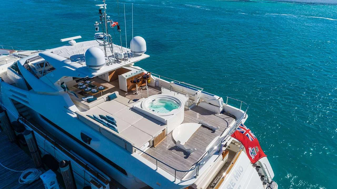 The yacht's sundeck features a luxurious hot tub and ample lounging space with stunning ocean views. aboard LA MAR Yacht for Charter