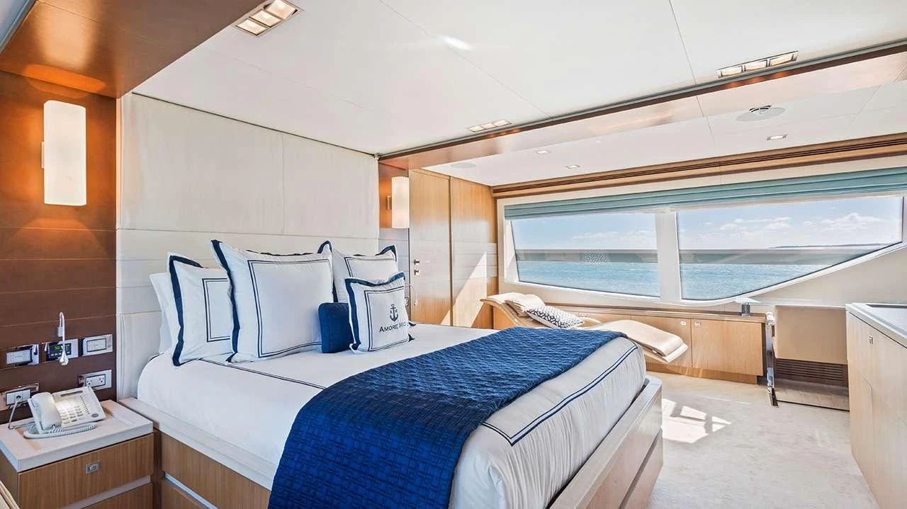 The master stateroom offers a luxurious and serene retreat with expansive ocean views. aboard LA MAR Yacht for Charter