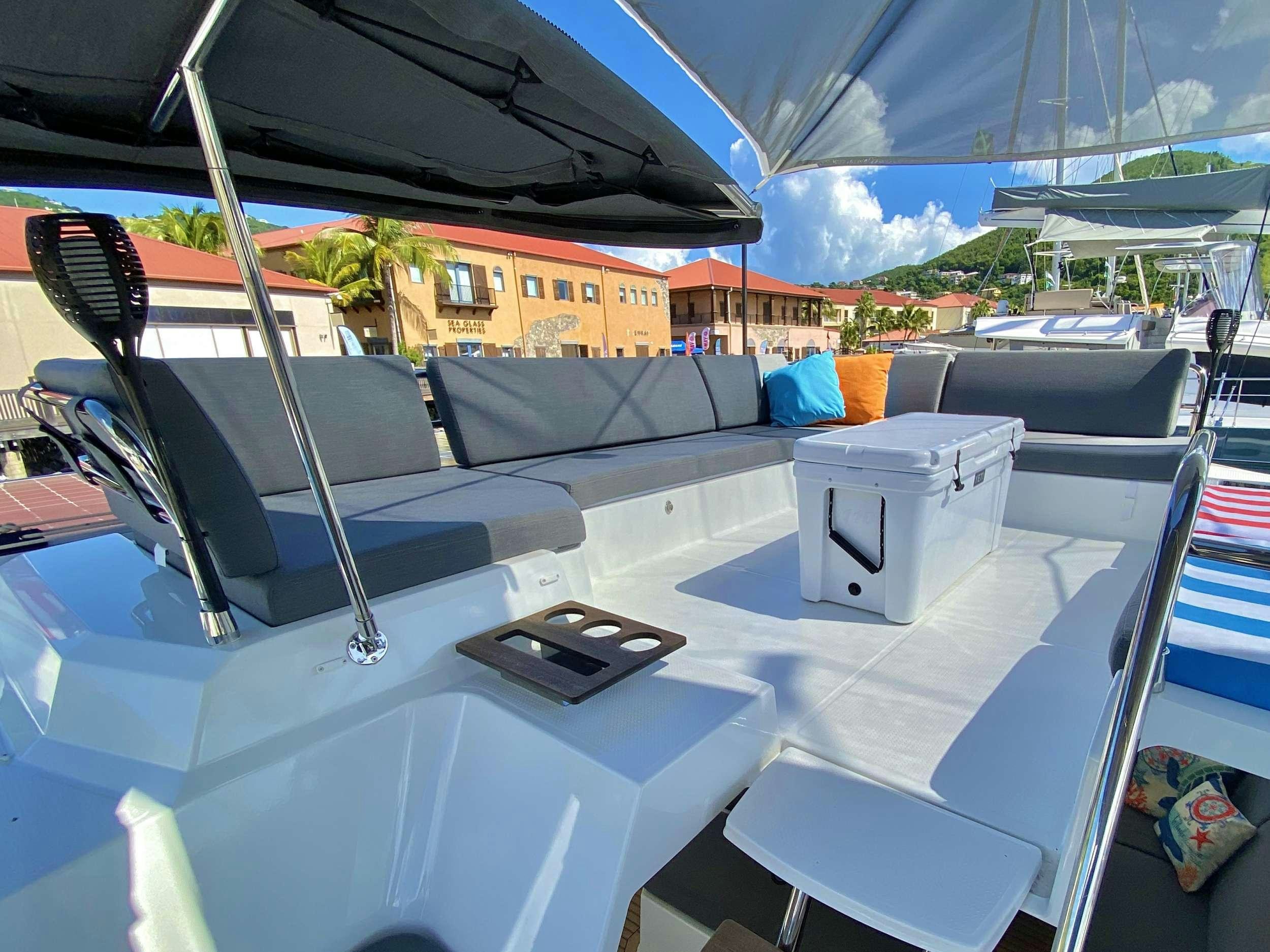 a boat with a laptop on it aboard O.V. Yacht for Charter