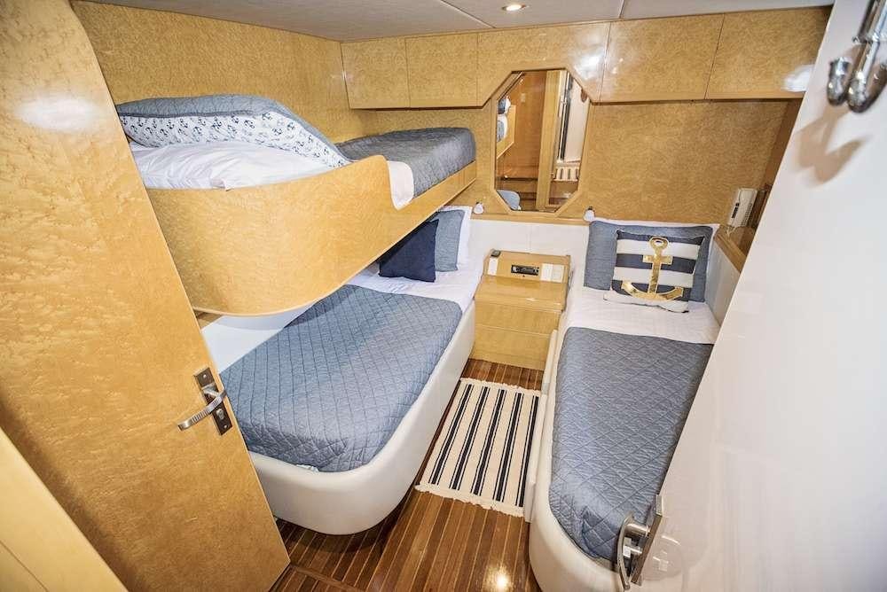 a bathroom with a sink and a bathtub aboard COOL BREEZE 65 Yacht for Charter