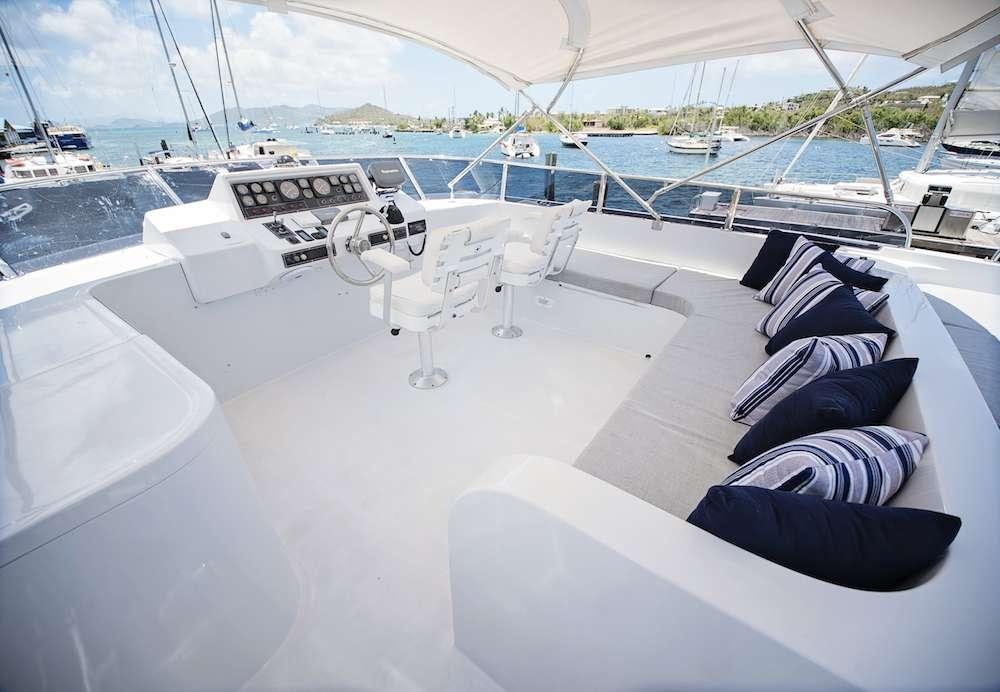 a boat on the water aboard COOL BREEZE 65 Yacht for Charter