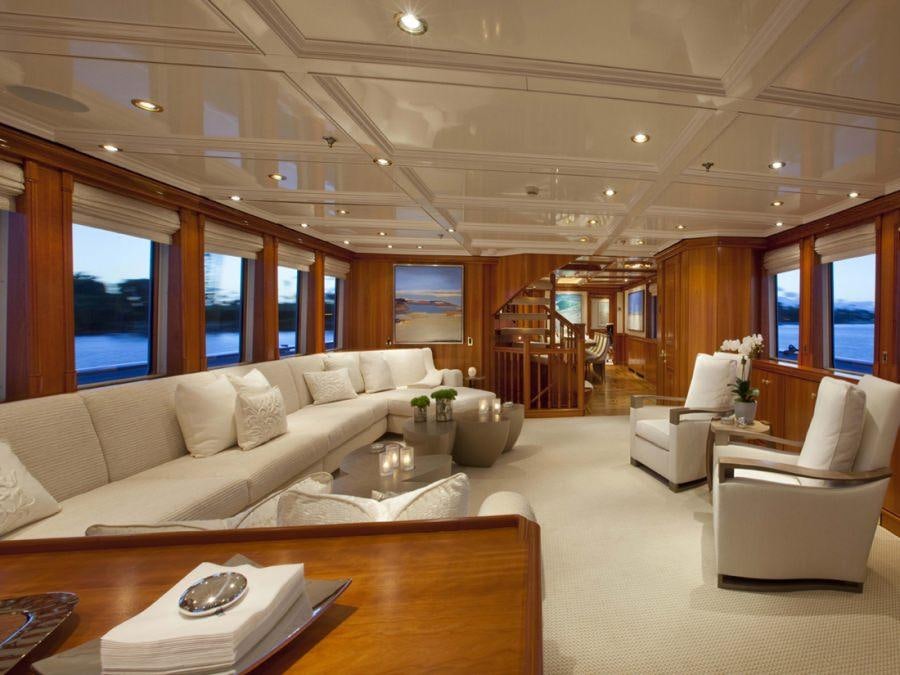 a living room with a large window aboard LEVERAGE Yacht for Charter