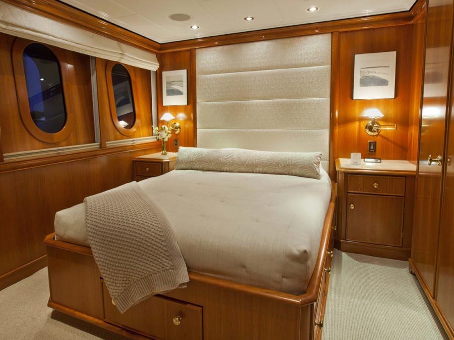 a bed in a room aboard LEVERAGE Yacht for Charter