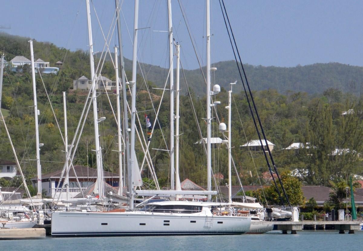 a boat in a harbor aboard MOJEKA  Yacht for Charter