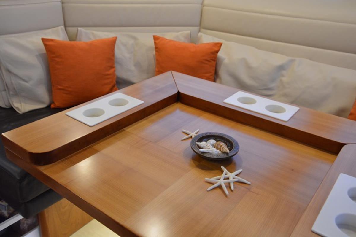 a table with a plate and a bowl on it aboard MOJEKA  Yacht for Charter