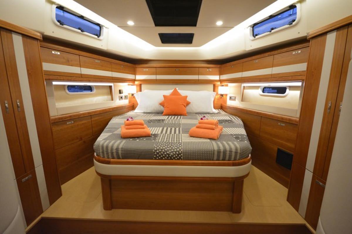 a bed in a room aboard MOJEKA  Yacht for Charter