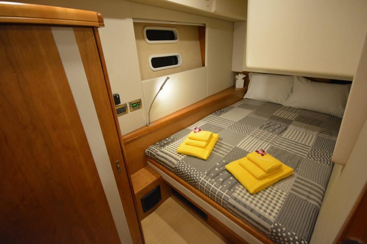 a yellow banana peel on a wooden table aboard MOJEKA  Yacht for Charter