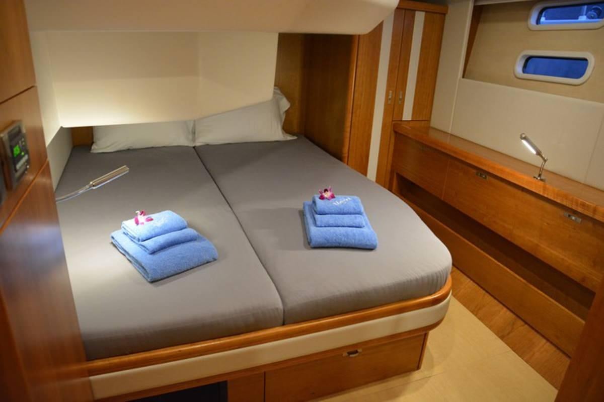 a bed in a room aboard MOJEKA  Yacht for Charter
