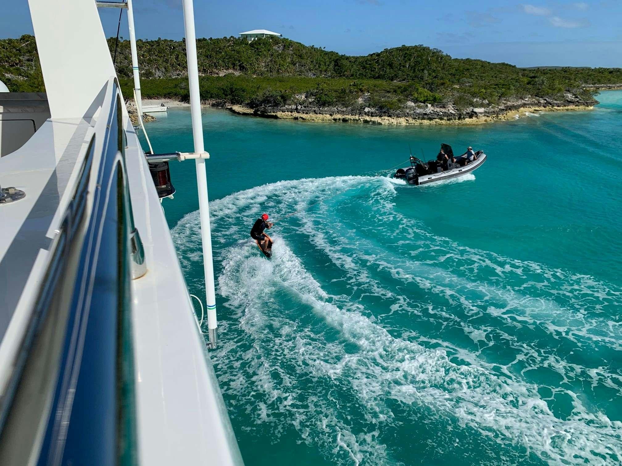 a group of people in a boat aboard SAMSARA Yacht for Charter