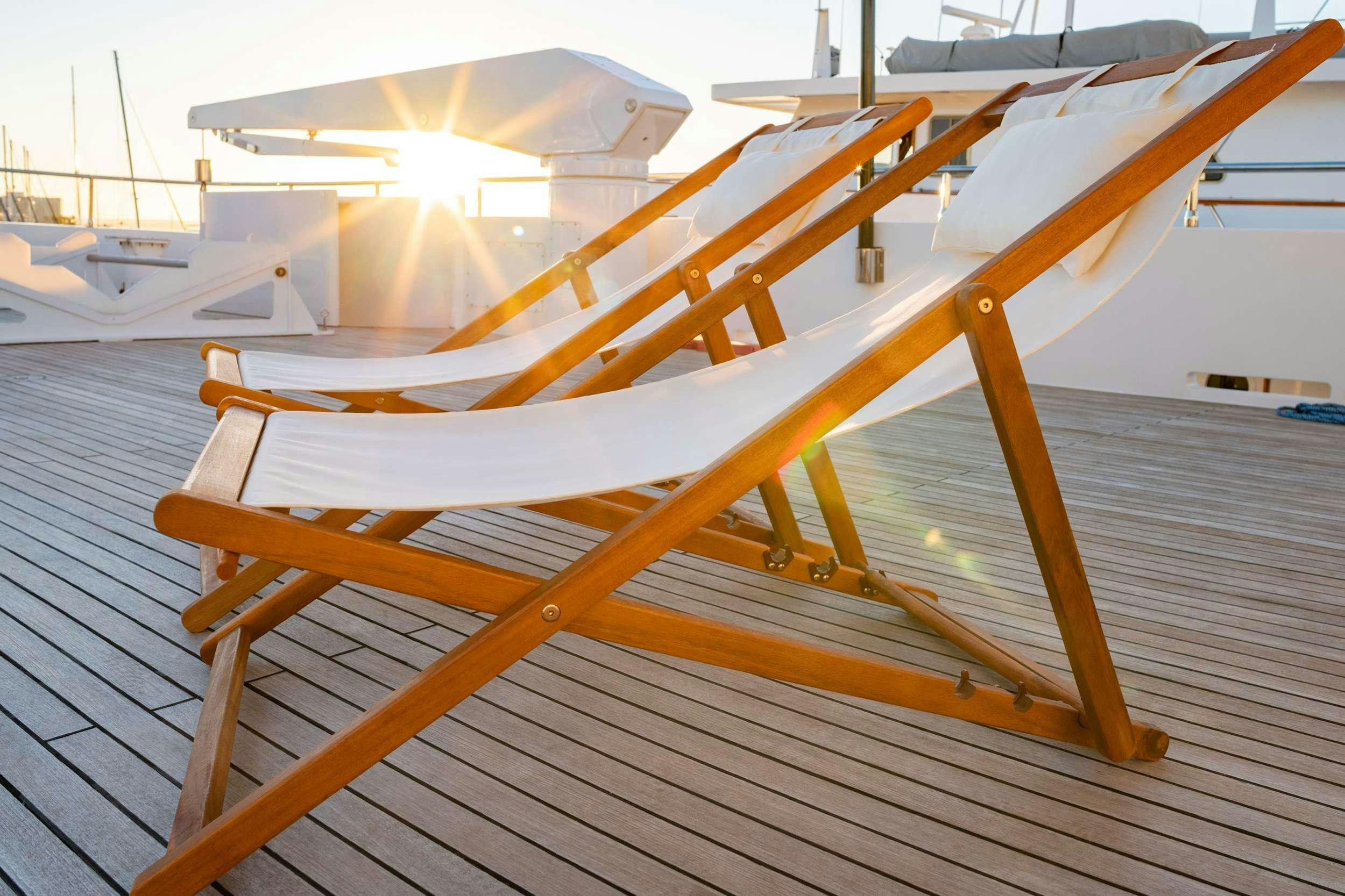 a wooden bench on a deck aboard SAMSARA Yacht for Charter