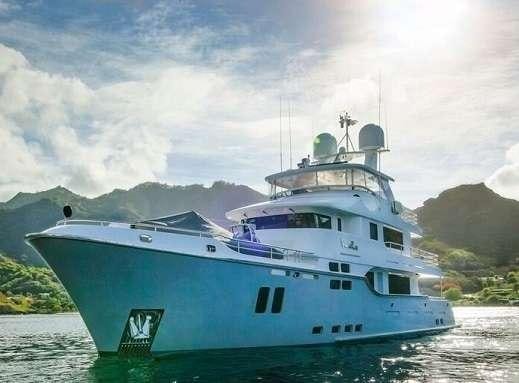 a large boat on the water aboard VIVIERAE II Yacht for Charter