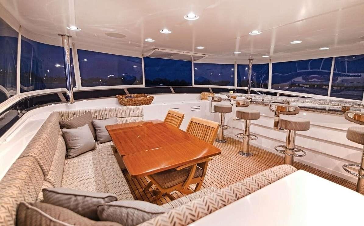 a room with a couch and a table aboard VIVIERAE II Yacht for Charter