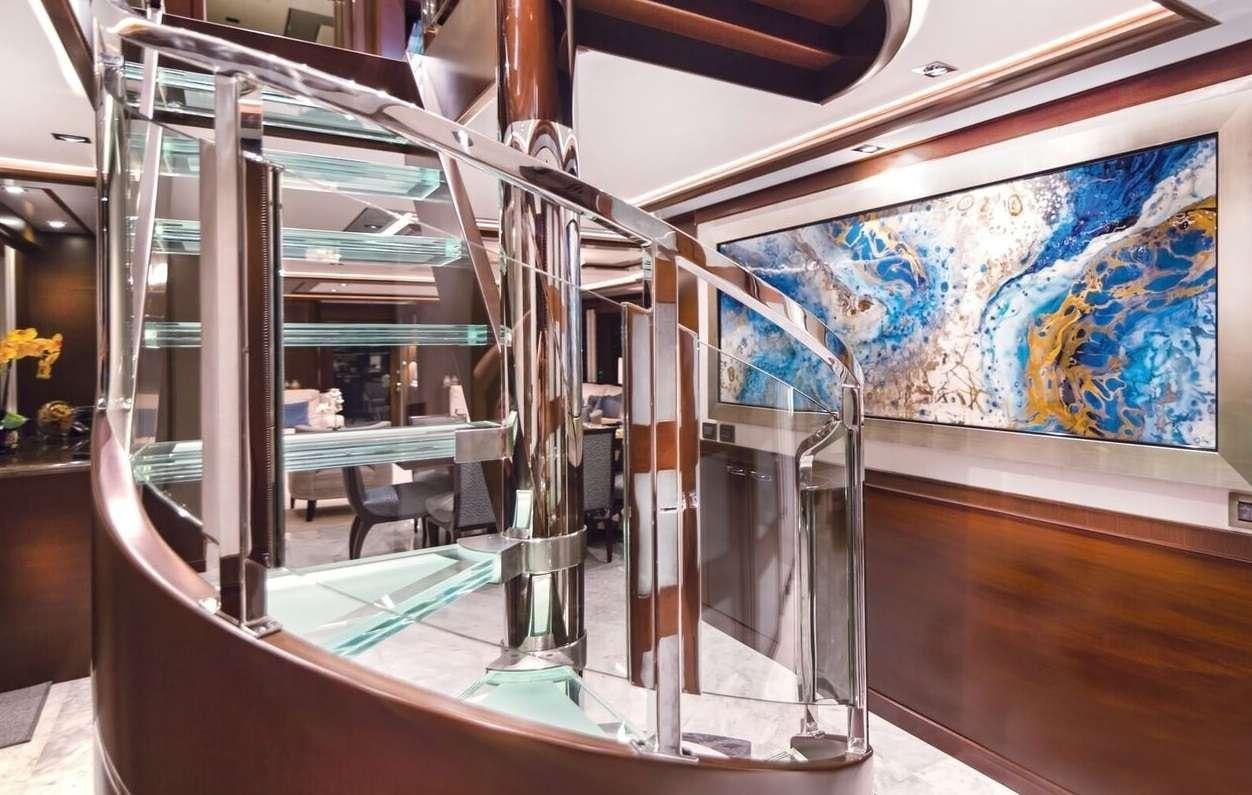a glass case with a glass display aboard VIVIERAE II Yacht for Charter