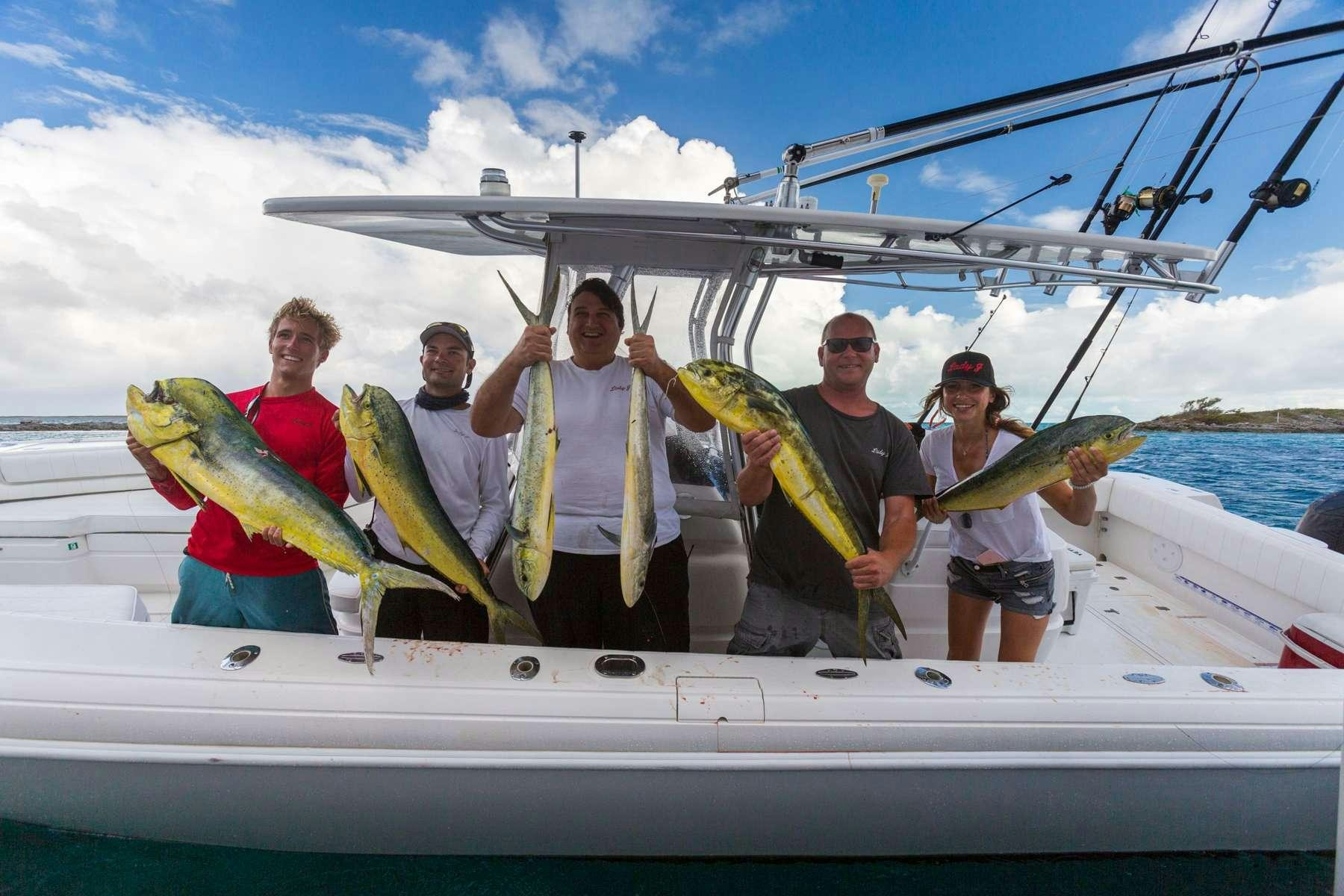 a group of people on a boat aboard LADY J Yacht for Charter