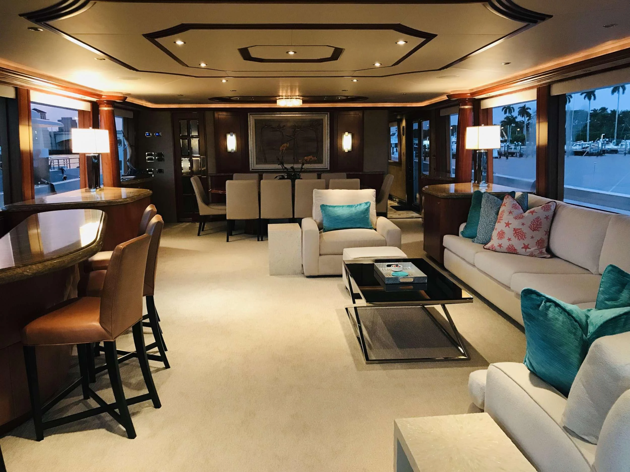 a living room with a large screen aboard RELENTLESS Yacht for Charter