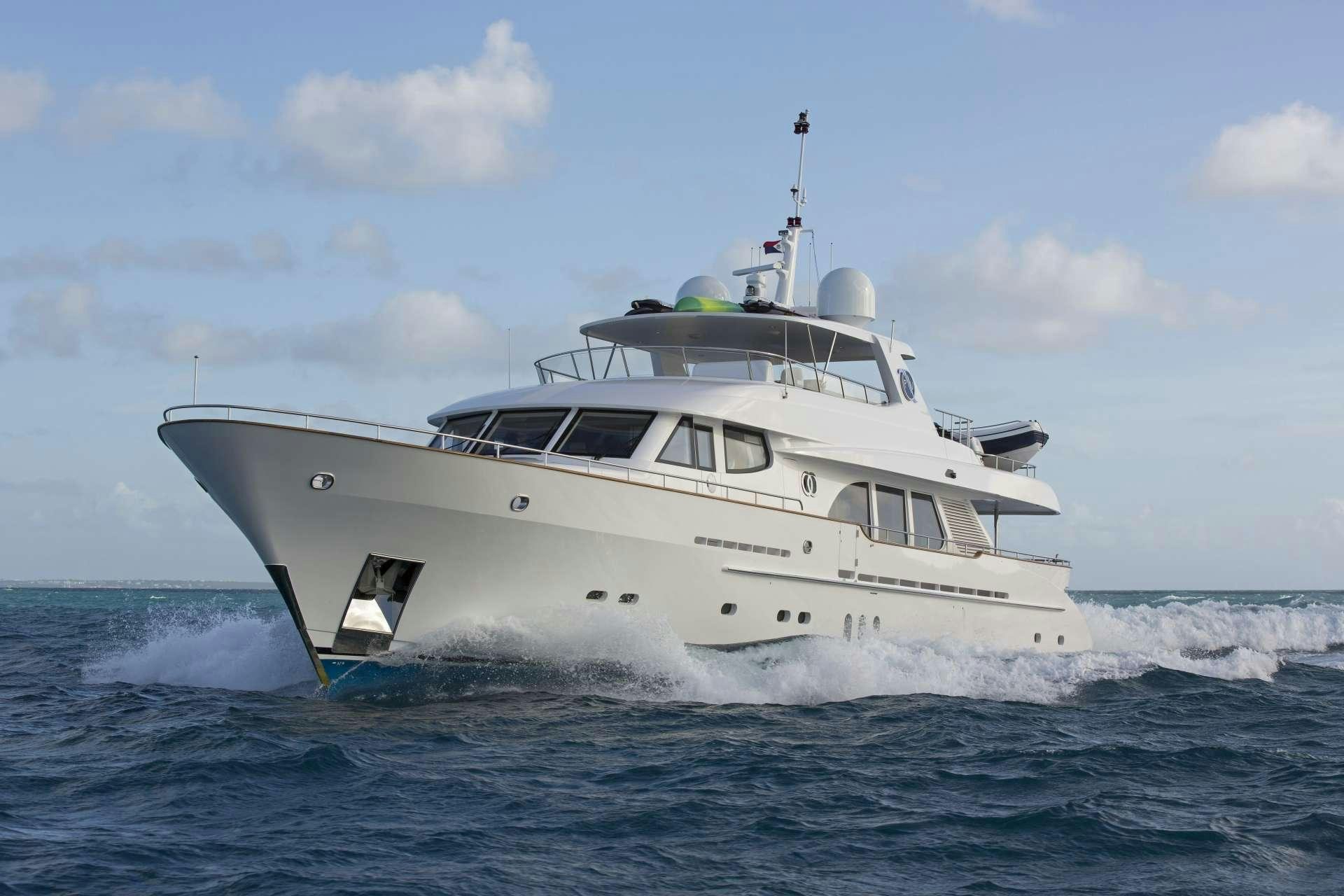 a white boat on the water aboard PURA VIDA Yacht for Charter