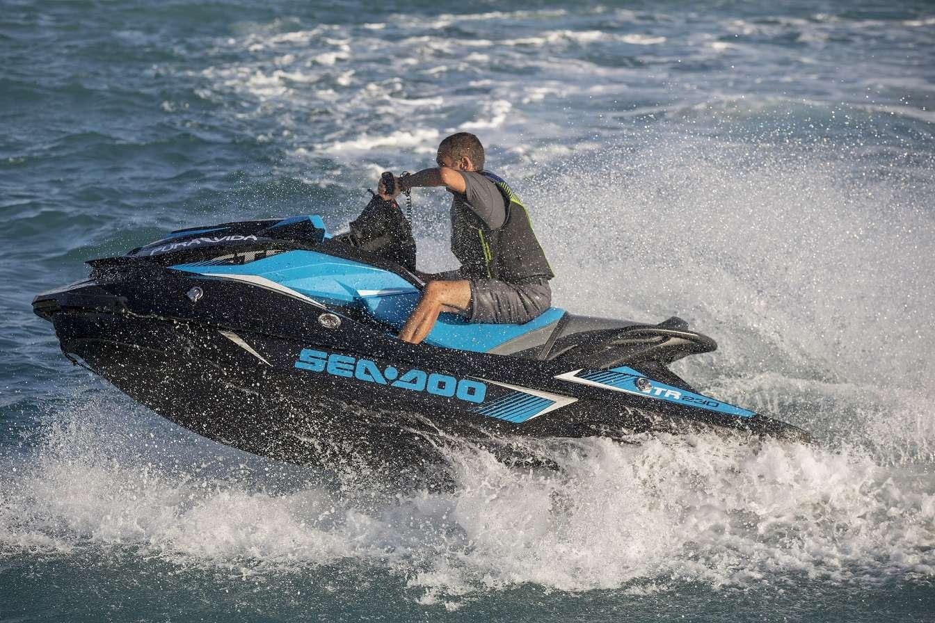 a man on a jet ski aboard PURA VIDA Yacht for Charter